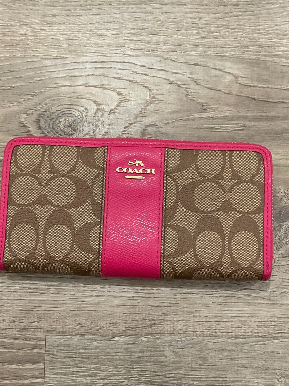 Coach pink and brown monogram long wallet with multiple slots